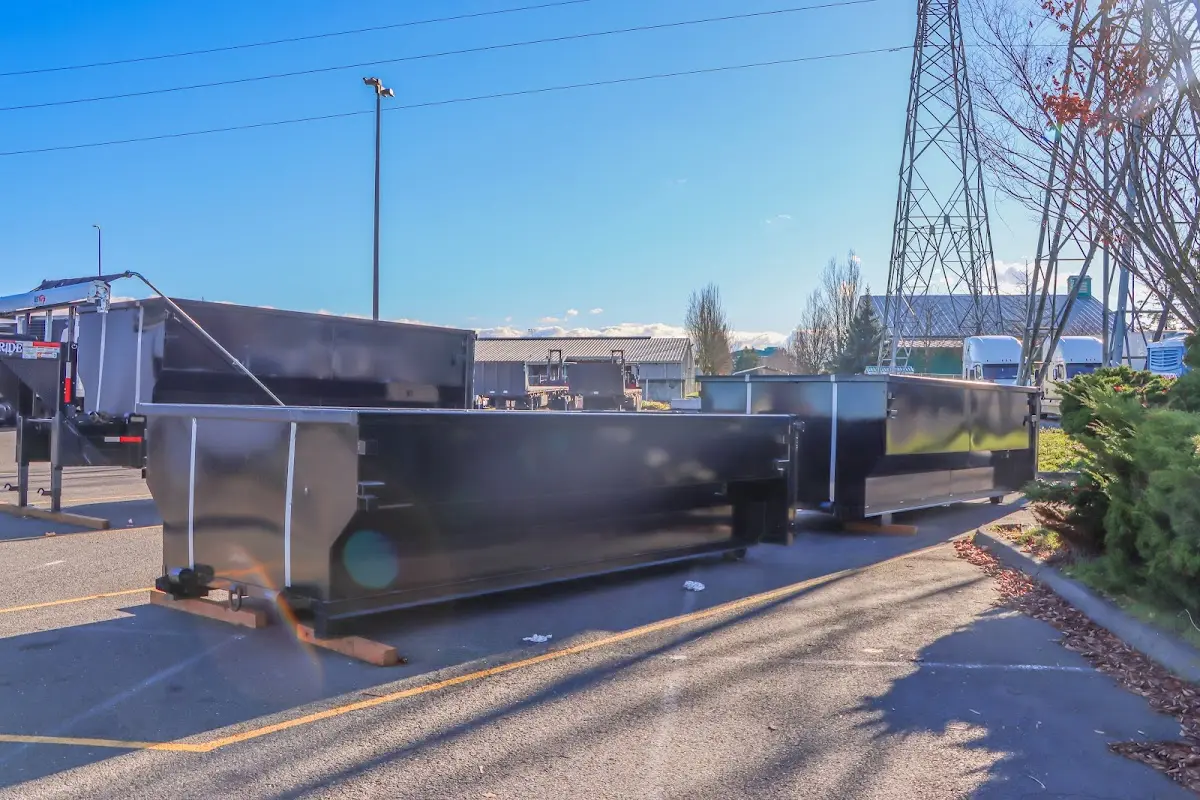 Roll-off dumpster ready for waste disposal at job site for Construction Dumpster Rental in Newark